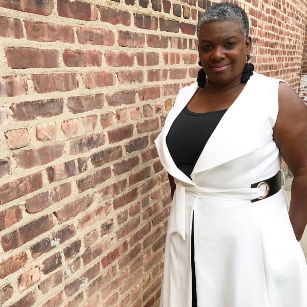 Long white dress/ vest with black leather belt
